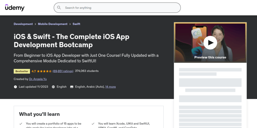 Page de destination du cours Udemy pour « iOS & Swift - le bootcamp complet de développement d'applications iOS », avec une note de 4,8 étoiles, un prix de 10,99 $ et un écran d'aperçu avec un instructeur tenant une note en papier colorée avec un visage souriant.