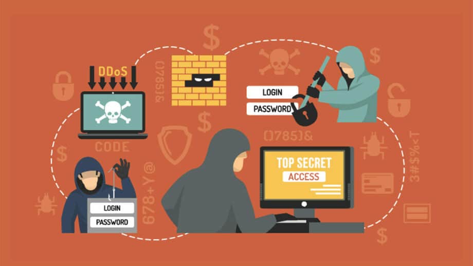 Un pirate d'homme et une femme hacker travaillent sur un ordinateur.
