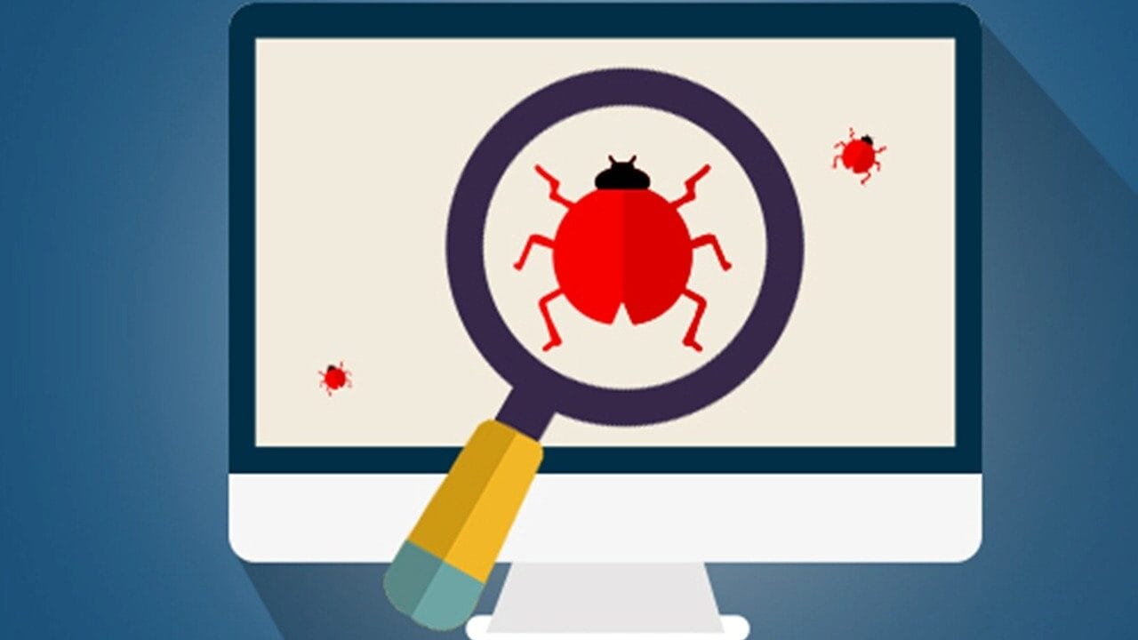 Un écran d'ordinateur affiche une loupe se concentrant sur un bug rouge, symbolisant la détection d'un bug logiciel.